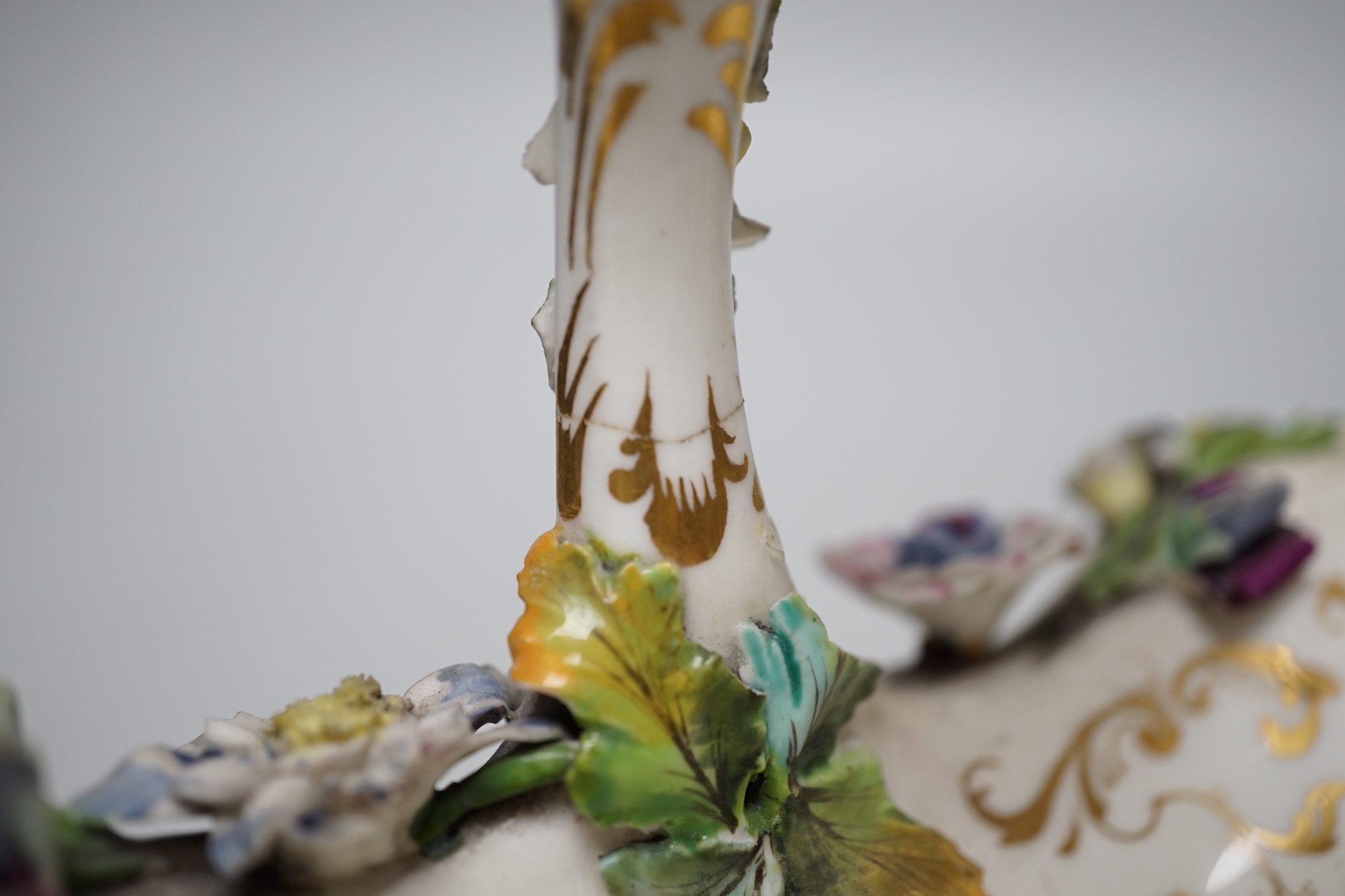 A Grainger Lee and co. miniature pot pourri vase with pierced cover, decorated with a view of Worcester Cathedral and the River Severn, on a blue ground, with two scroll handles and four paw feet and a Coalbrookdale flor